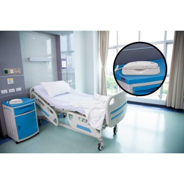 Teléfono monobloque analógico compacto con teclado integrado en el auricular en una habitación de hospital